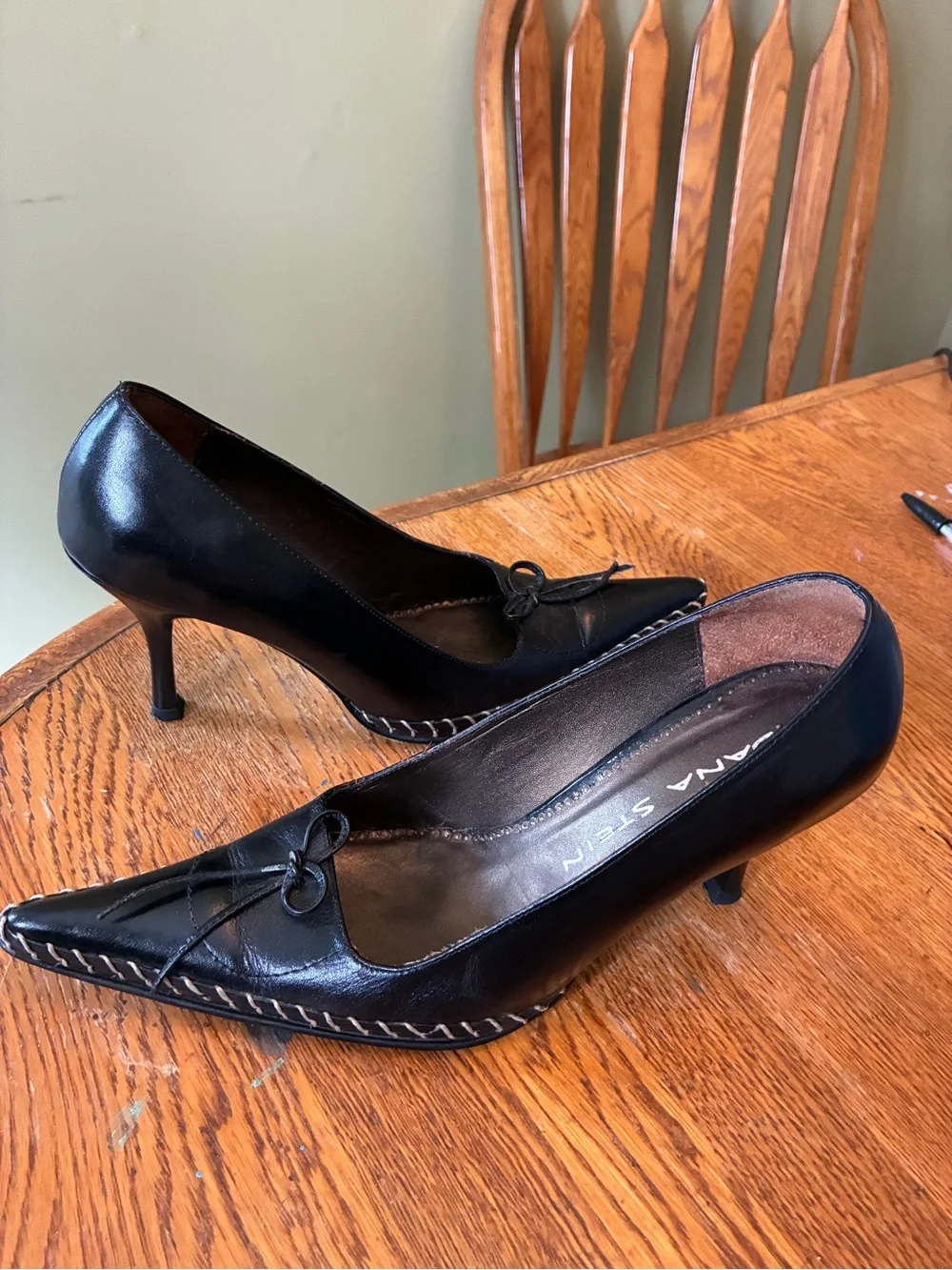 Black Pointed Leather Heels with Bow Accent